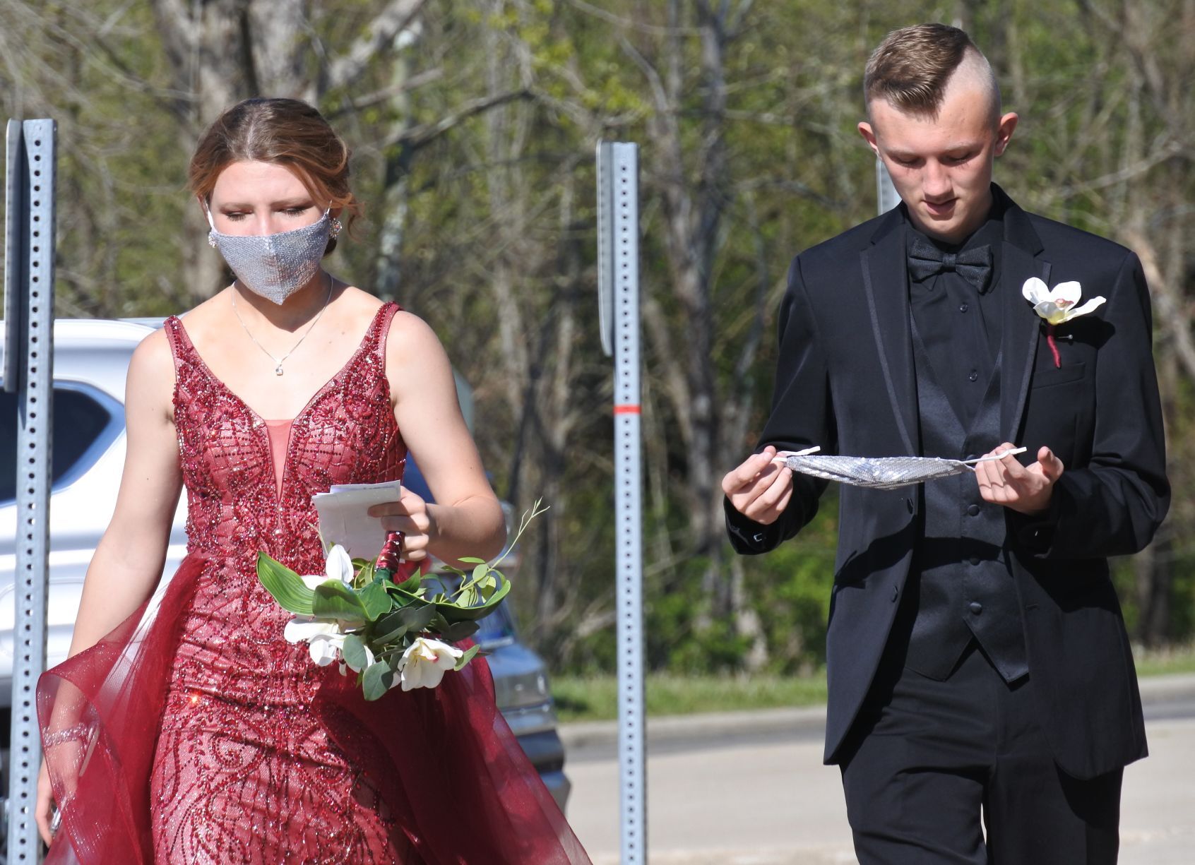 Promgoers mask up for dance